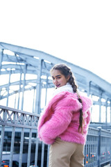 young pretty teenage girl posing cheerful happy smiling wearing street style outside in europe city, lifestyle people concept