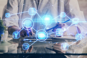Social network theme hologram over woman's hands writing background. Concept of international people connect. Double exposure