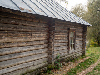 side view of an old house made of timber. Vintage buildings