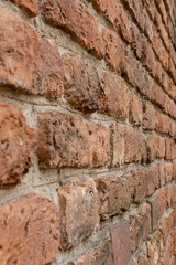 Brown and beige peach brick wall