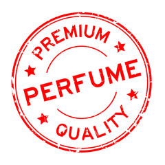 Grunge red premium quality perfume word round rubber seal stamp on white background