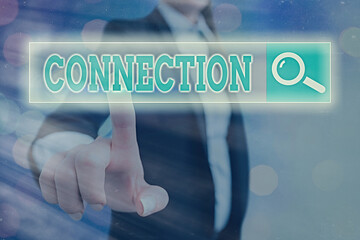 Conceptual hand writing showing Connection. Concept meaning relationship in which an individual,...