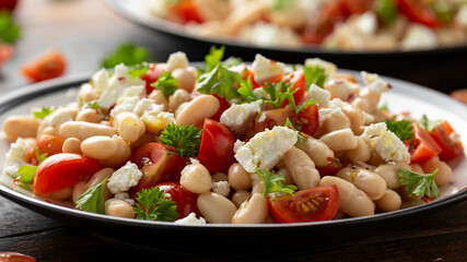 White Bean Salad with Cherry Tomatoes, Feta cheese and parsley. Healthy vegetarian, vegan food