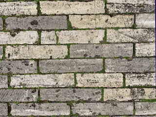 Old grey bricks background