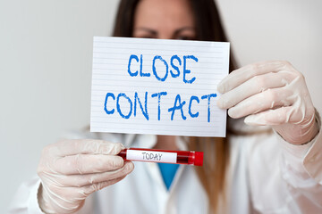 Text sign showing Close Contact. Business photo showcasing having a history of direct exposure to a...