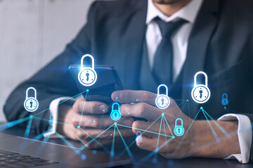 Businessman using on-line app on phone. Lock hologram. Multiexposure. Internet security concept.