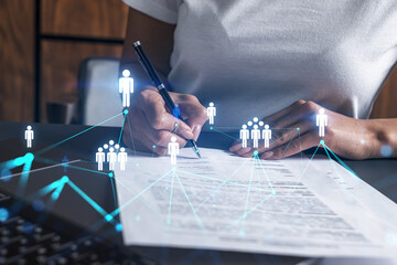 Woman signs agreement. Social network and planet earth hologram. Double exposure. Internet people...