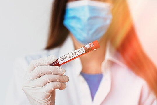 Text sign showing Cryptocurrency. Business photo text form of currency that exists digitally has no central issuing Laboratory blood test sample shown for medical diagnostic analysis result