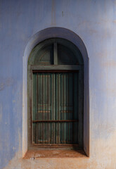 Fototapeta premium green window on old retro building.