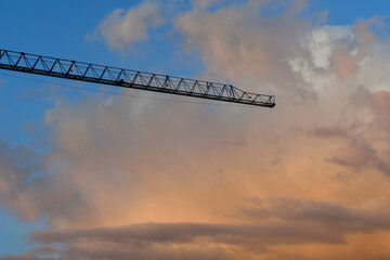 Crane construction with beautiful sky at sunset