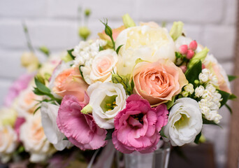 A beautiful bouquet of flowers - the decor at the wedding design. The prism of the table of the young. Wedding decor