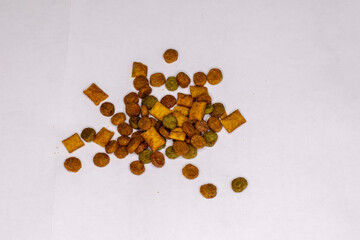 Dry cat food in pellet form.