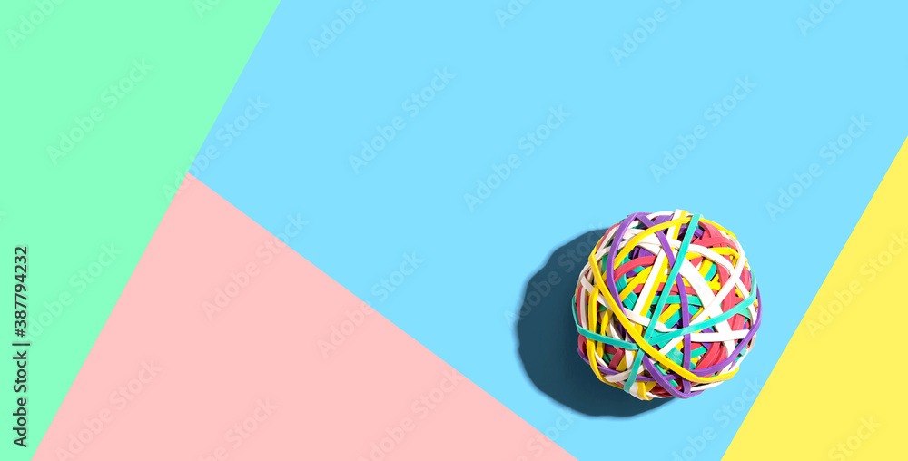 Poster elastic band ball with drop shadow overhead view - flat lay