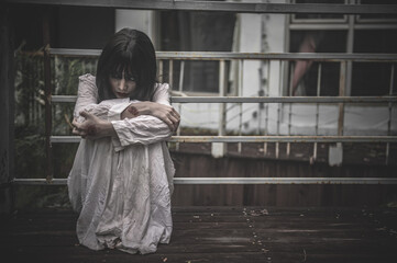 Portrait of asian woman make up ghost,Scary horror scene for background,Halloween festival...