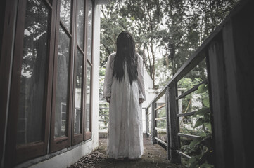 Portrait of asian woman make up ghost,Scary horror scene for background,Halloween festival...
