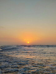 Naklejka na ściany i meble wonderful sunrise / sunset on the beach / sea