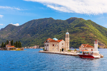 Fototapeta premium Church of Our Lady of the Rocks and Island of Saint George in the Adriatic sea, Bay of Kotor, Perast, Montenegro