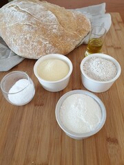 Three flours, white, durum and whole wheat, oil and salt for freshly baked homemade bread