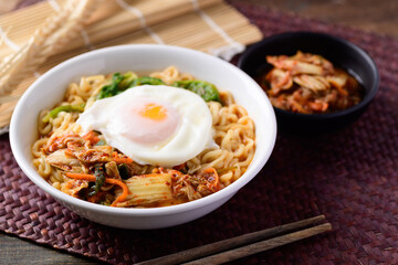 Korean food, Spicy noodles soup with kimchi and egg, Top view