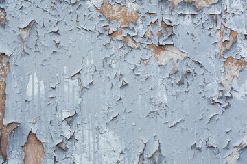 Cracked, peeling paint on the wall, texture, background