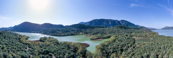 The beautiful panorama landscapes of Kovada Lake, mountains and  green area from the air Isparta, Turkey Lake District.
