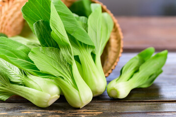 Fresh Bok Choy or Pak Choi(Chinese cabbage) on wooden background, Organic vegetables