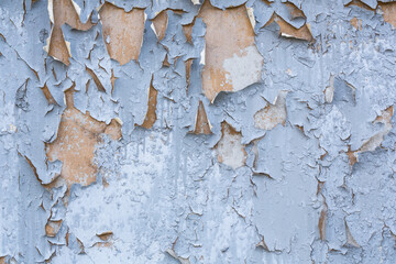 Cracked, peeling paint on the wall, texture, background