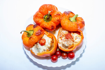 Stuffed with minced meat peppers. Close up on white background
