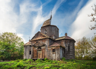 Old wooden abandoned church in the village of Burkivtsi Ukraine
