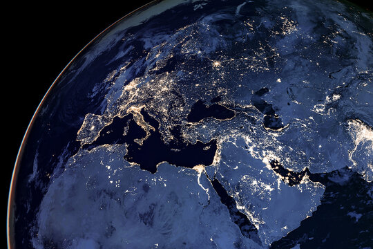 Earth from space at night. View from satellite orbit to the lights of cities in Europe, the Middle East and North Africa on the earth globe. Elements of this image courtesy of NASA.