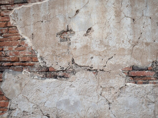 Concrete wall crack until see bricks, concrete look like fish head