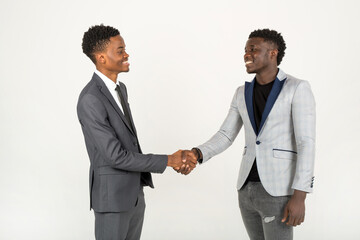 two handsome african men in suits on a white background