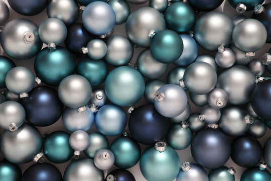 Christmas decorations, top view of pile of glass balls colored in blue, useful as a greeting gift card background 
