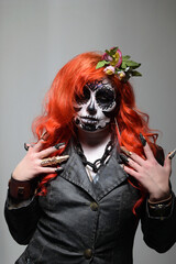 Zombie girl. Stodio portrait of female model with Halloween makeup. Halloween conception