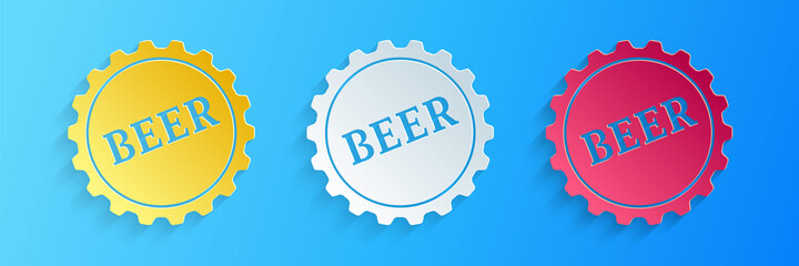 Paper cut Bottle cap with beer word icon isolated on blue background. Paper art style. Vector.