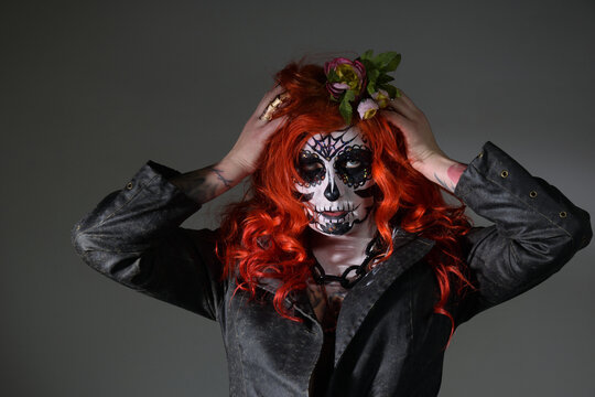 Zombie girl. Stodio portrait of female model with Halloween makeup. Halloween conception