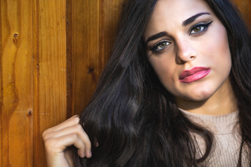 Portrait of a beautiful brunette girl with hazel eyes