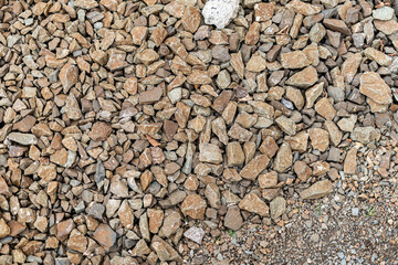 The texture of fine brown rubble.