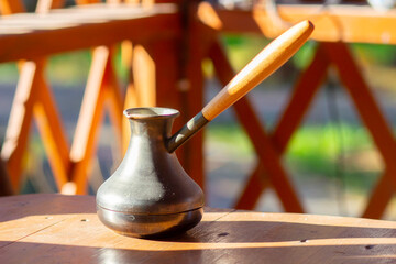 Old vintage traditional Turk coffee maker for a fragrant morning drink