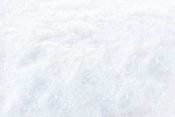 Obraz premium Winter bright background with white pure snow. Fresh snow texture close up. Copy space.