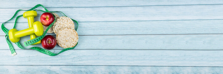 bread Apple and dumbbells. © alexbush