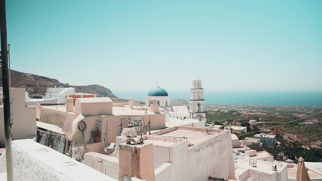 Landscape clip of a Greek island during summer with a chappel in view