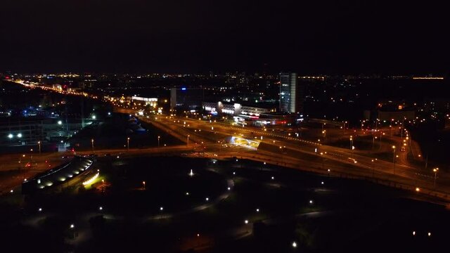 Nice view of the night highway with cars in the city