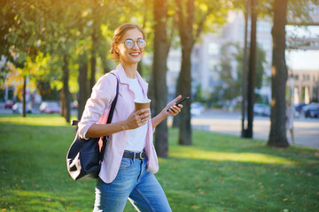 Businesswoman standing summer park Business person