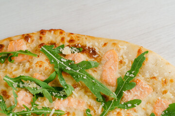 Big pizza isolated on white background. Tasty fast food at quarantine coronavirus covid-19 period. Food delivery for people who stay at home