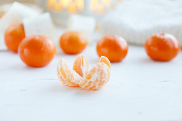 mandarin oranges. ripe juicy peeled mandarin orange. isolated on white background