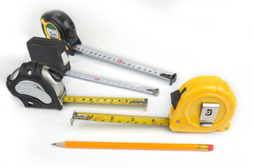 Measure tapes  on a white background. Inches and centimeters