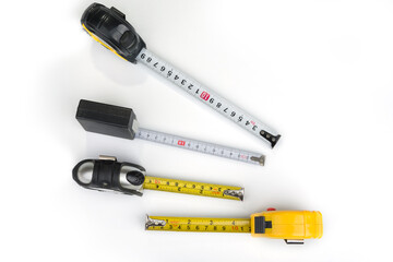 Measure tapes  on a white background. Inches and centimeters