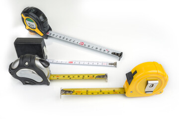 Measure tapes  on a white background. Inches and centimeters