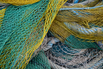 View on fishermans tackles and nets near coastal town Terracina, Latina, Italy on sunset